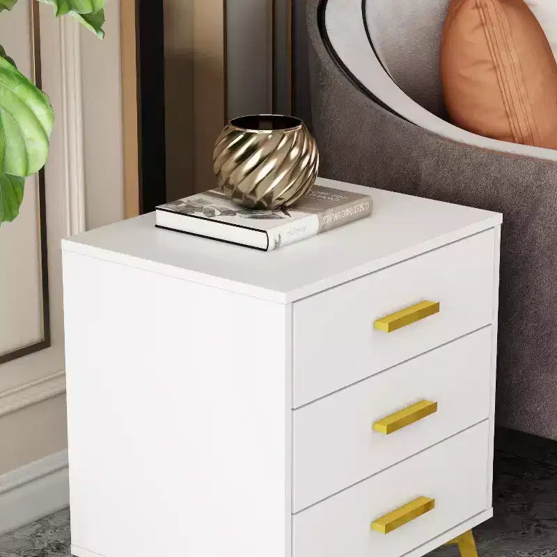 White Nightstand: Stylish Storage with Golden Accents